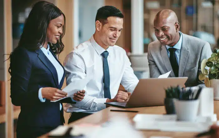 Diverse group of smiling businesspeople working in an office